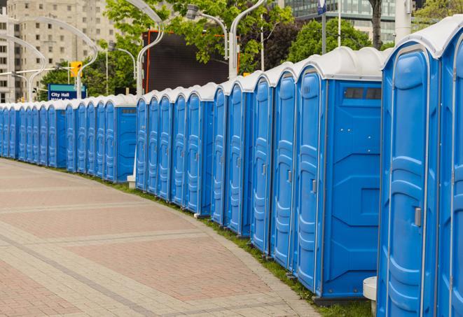 a row of portable restrooms at a fairground, offering visitors a clean and hassle-free experience in norwalk
